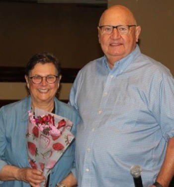President Greg McCune presented an award to Sharon Fincham for her service to the Optimist Club arranging Youth of the Month.
