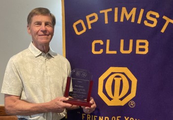 Tom Hintz with a plaque thanking him for all the things he did as governor